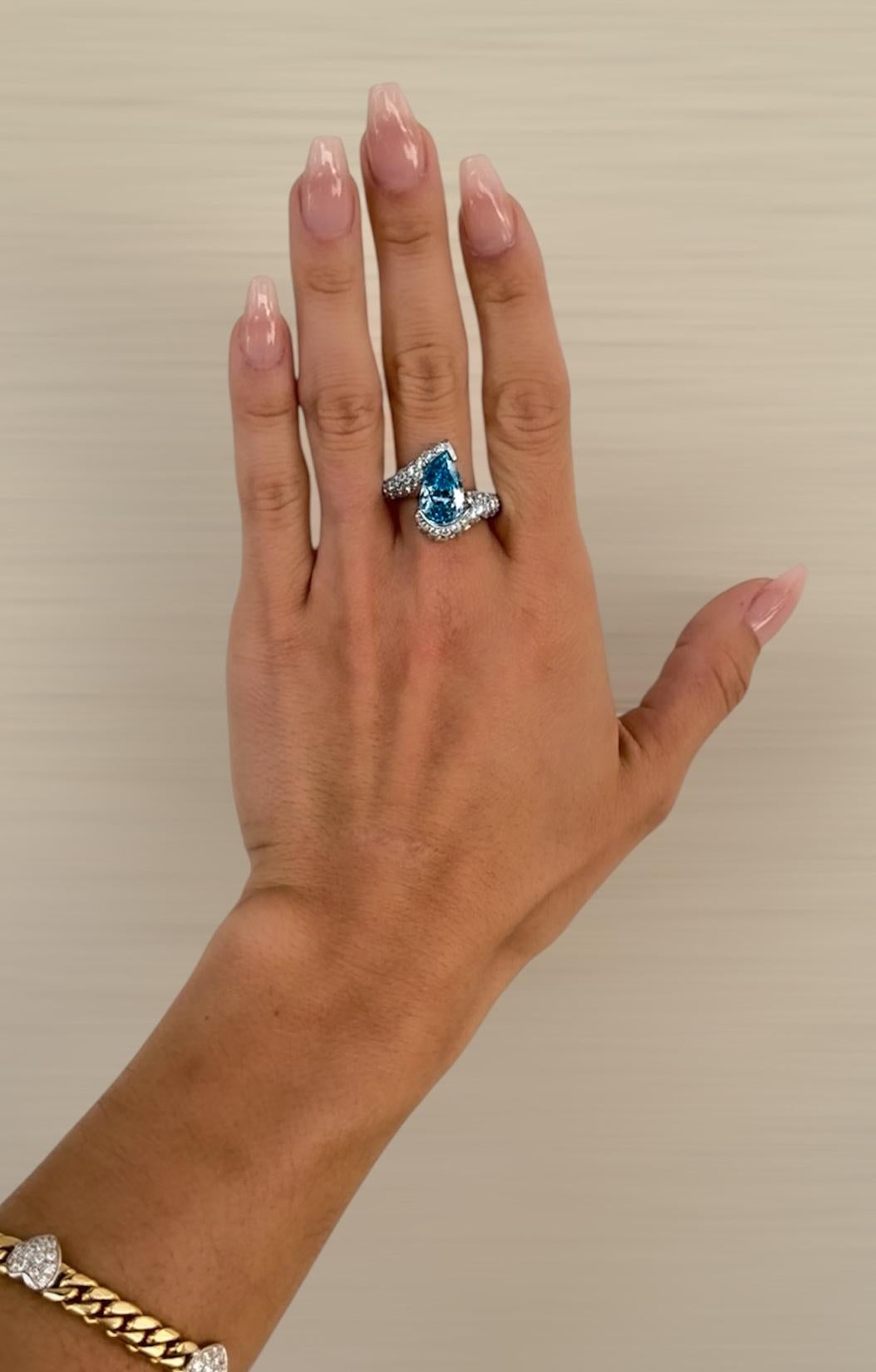 Pear Cut Platinum Ring with Vivid Blue Diamond