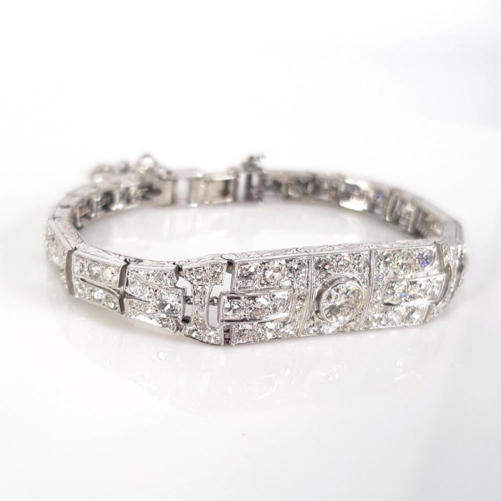 This Beautiful studded Vintage Art Deco Tennis Bracelet is set in Platinum, weighs 26.8 grams and measures an estimated 20cm in length. This Bracelet features 1 Rose Cut Diamond (LM I1/2) weighing an estimated 0.42 carat, 2 0.15carat Diamonds, 24