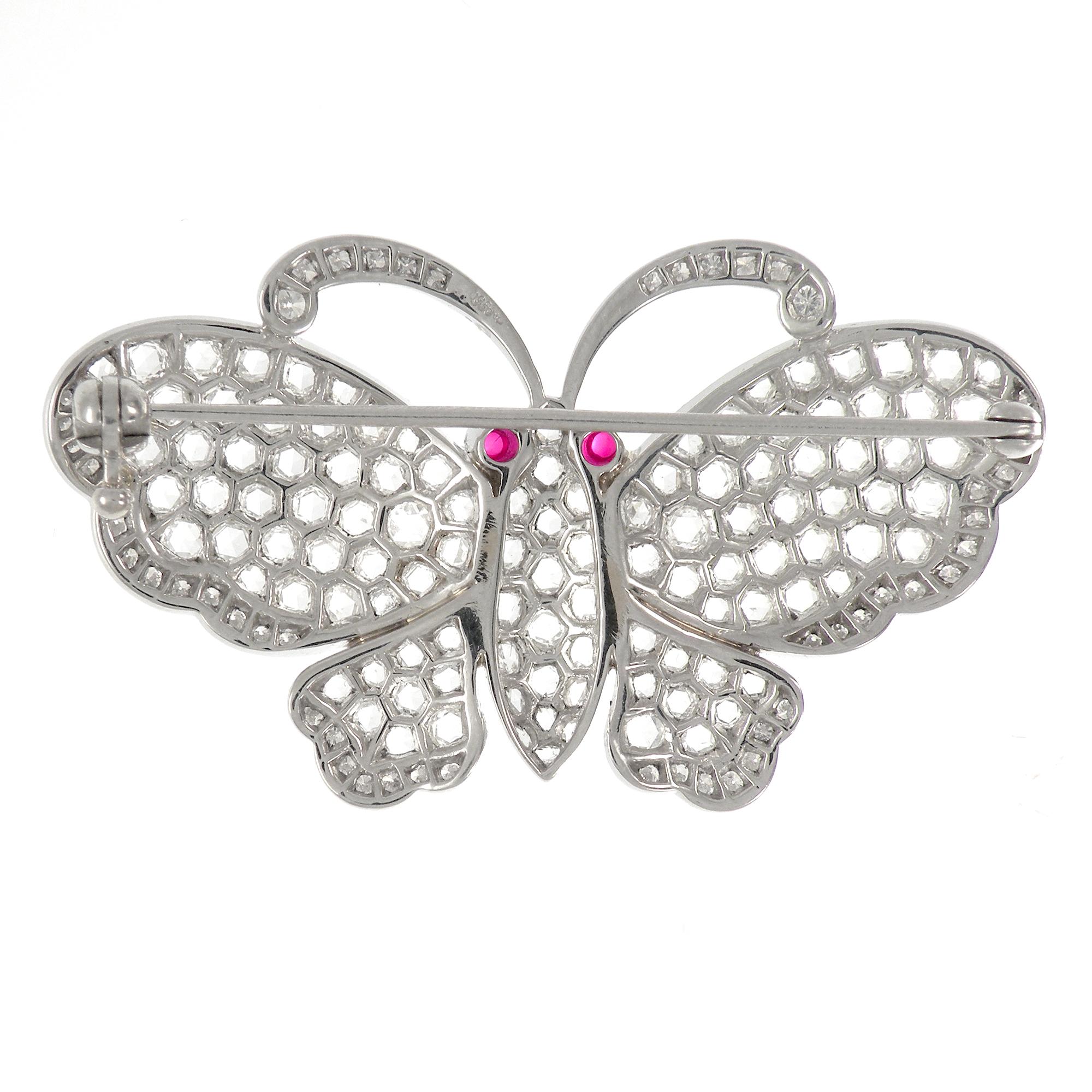
This Beautiful Rose Cut Diamond Butterfly brooch is handcrafted in Platinum, features rose cut diamonds of 2.68 carats, full cut diamonds of 0.44 carats and 2 small cabochon rubies of 0.15 carats on the eyes.