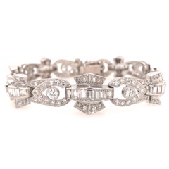 Platin-Deko-Gliederarmband mit runden und Baguette-Diamanten