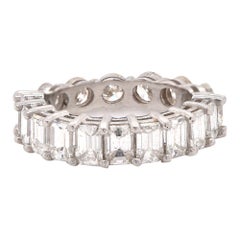 Bracelet éternel en platine avec diamants ronds et baguettes