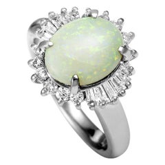 Platinum Round and Baguette Diamonds and Opal Oval Ring