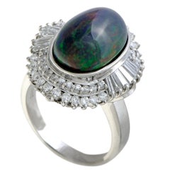 Platinum Round and Baguette Diamonds and Opal Oval Ring