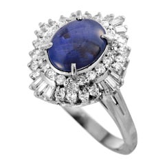 Platinum Round and Baguette Diamonds and Sapphire Oval Ring