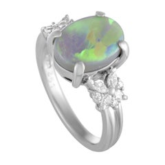 Platinum Round and Marquise Diamonds and Opal Oval Ring
