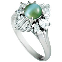 Platinum Round and Tapered Baguette Diamond and Green Cat
s Eye Ring