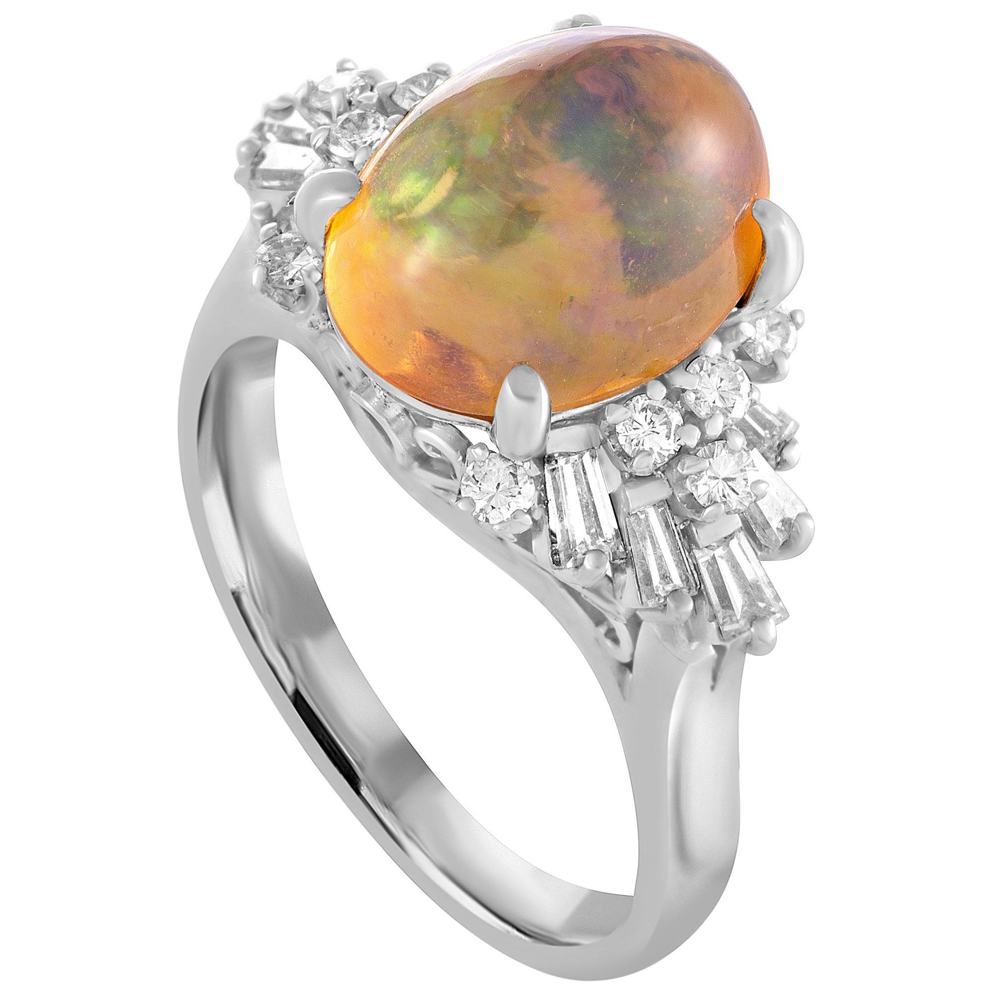 Platinum Round and Tapered Baguette Diamond and Opal Cabochon Ring