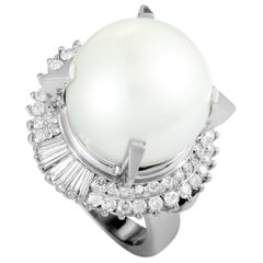 Platinum Round and Tapered Baguette Diamonds and Pearl Ring