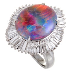 Platinum Round and Tapered Baguette Diamonds and Blue Fire Opal Oval Ring