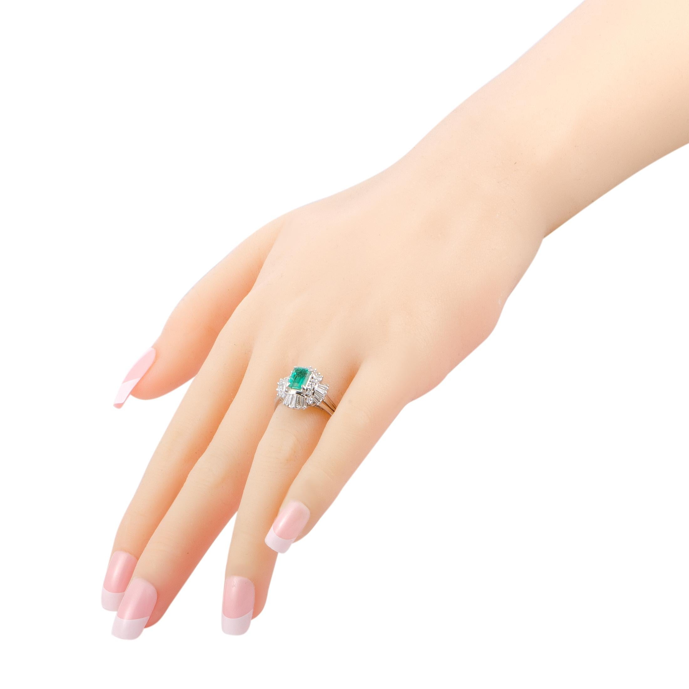 Women's Platinum Round and Tapered Baguette Diamonds and Emerald Oval Ring