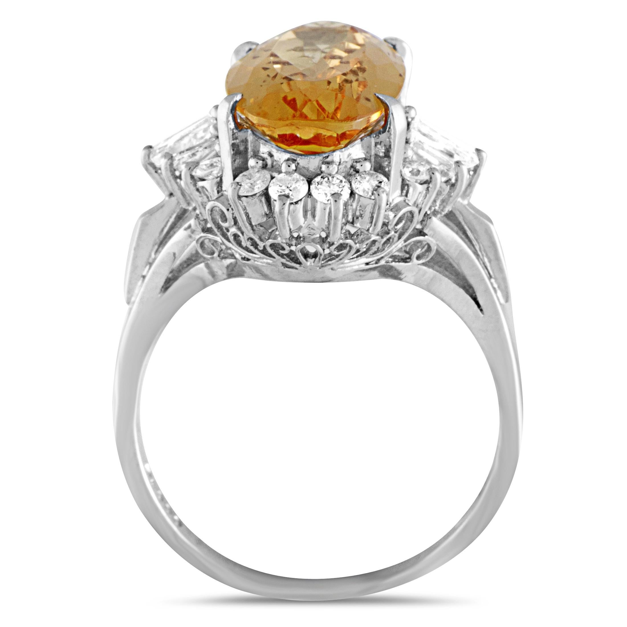 A sparkling boundary of resplendent diamonds, weighing 0.57carats, glamorously accentuates the beautiful orange topaz, weighing 4.62 carats, in this exuberant ring that is expertly crafted from luxurious platinum.
Ring Top Dimensions: 16mm x16mm
