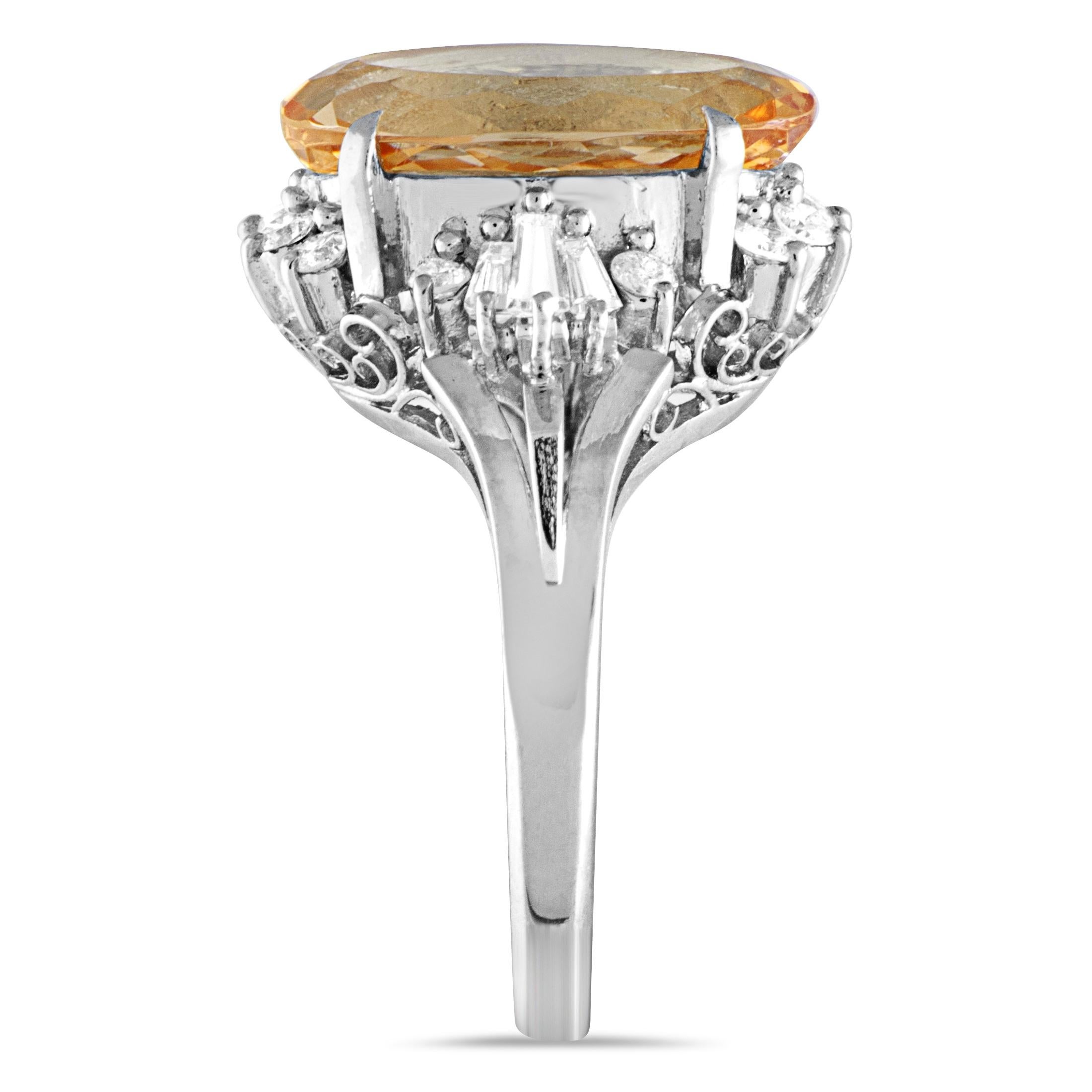 Round Cut Platinum Round and Tapered Baguette Diamonds and Imperial Orange Oval Topaz Ring