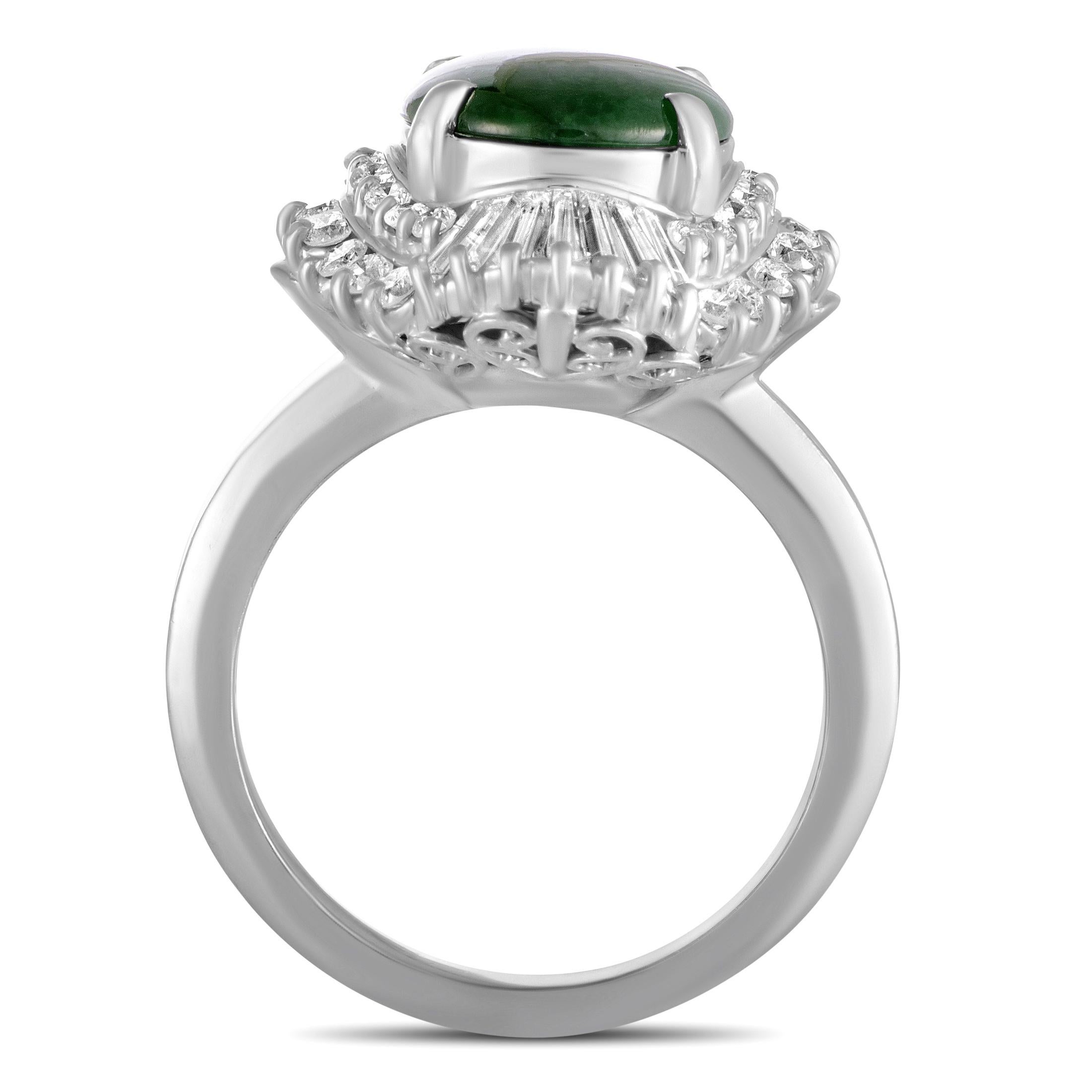 This ring is crafted from platinum and set with a jade that weighs 3.07 carats and with round and tapered baguette diamonds that amount to 1.07 carats. The ring weighs 15 grams, boasting band thickness of 3 mm and top height of 9 mm, while top