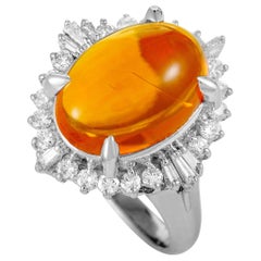 Platinum Round and Tapered Baguette Diamonds and Opal Oval Ring