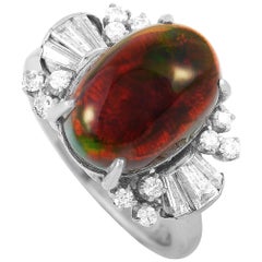 Platinum Round and Tapered Baguette Diamonds and Opal Ring