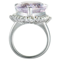 Platinum Round and Tapered Baguette Diamonds and Pear Kunzite Ring