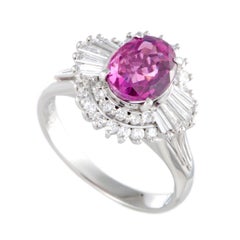 Platinum Round and Tapered Baguette Diamonds and Pink Sapphire Oval Ring