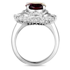 Platinum Round and Tapered Baguette Diamonds and Pink Tourmaline Ring