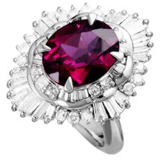 Platinum Round and Tapered Baguette Diamonds and Pink Tourmaline Ring