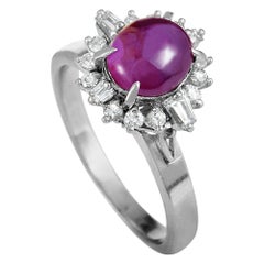 Platinum Round and Tapered Baguette Diamonds and Ruby Cabochon Oval Ring Platinum Round and Tapered Baguette Diamonds and Ruby Cabochon Oval Ring