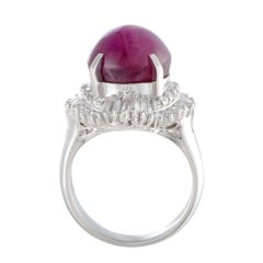 Platinum Round and Tapered Baguette Diamonds and Ruby Cabochon Ring