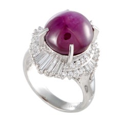 Platinum Round and Tapered Baguette Diamonds and Ruby Cabochon Ring
