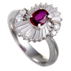 Platinum Round and Tapered Baguette Diamonds and Ruby Oval Ring