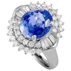 Platinum Round and Tapered Baguette Diamonds and Sapphire Oval Ring
