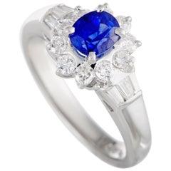 Platinum Round and Tapered Baguette Diamonds and Sapphire Oval Ring