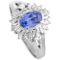 Platinum Round and Tapered Baguette Diamonds and Sapphire Oval Ring