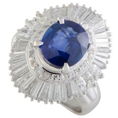Platinum Round and Tapered Baguette Diamonds and Sapphire Oval Ring