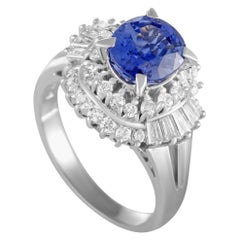Platinum Round and Tapered Baguette Diamonds and Sapphire Ring