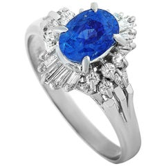 Platinum Round and Tapered Baguette Diamonds and Sapphire Ring