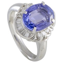 Platinum Round and Tapered Baguette Diamonds and Tanzanite Oval Ring