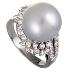 Platinum Round and Tapered Baguette Diamonds and White Pearl Ring