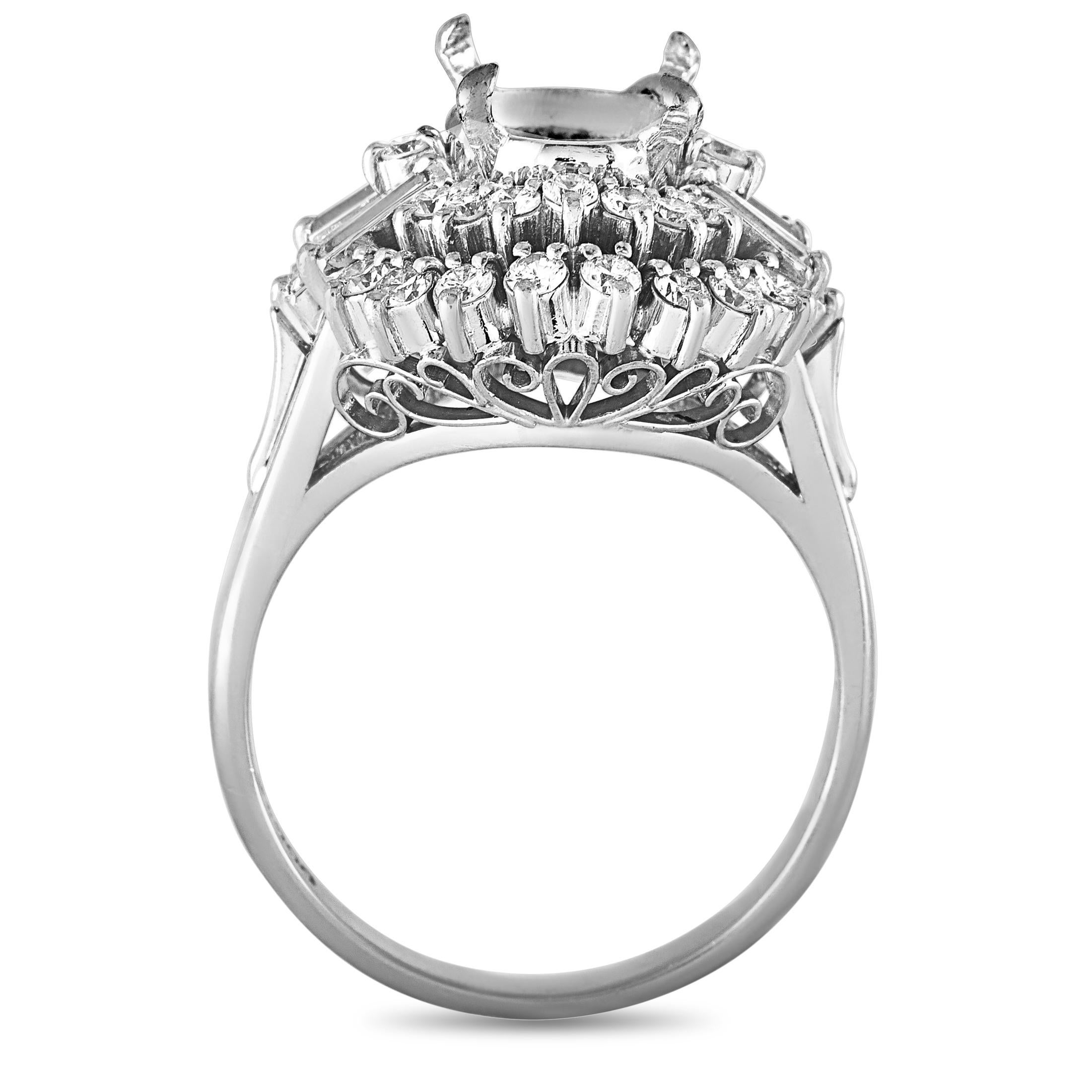 This mounting ring is made out of platinum and round and tapered baguette diamonds that total 0.85 carats. The ring weighs 8.4 grams and boasts band thickness of 2 mm and top height of 10 mm, while top dimensions measure 15 by 17 mm.
Ring Size: