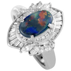 Platinum Round, Baguette, and Marquise Diamonds and Opal Oval Ring