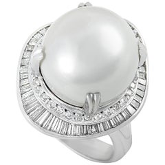 Platinum Round, Baguette and Tapered Baguette Diamonds and Pearl Ring