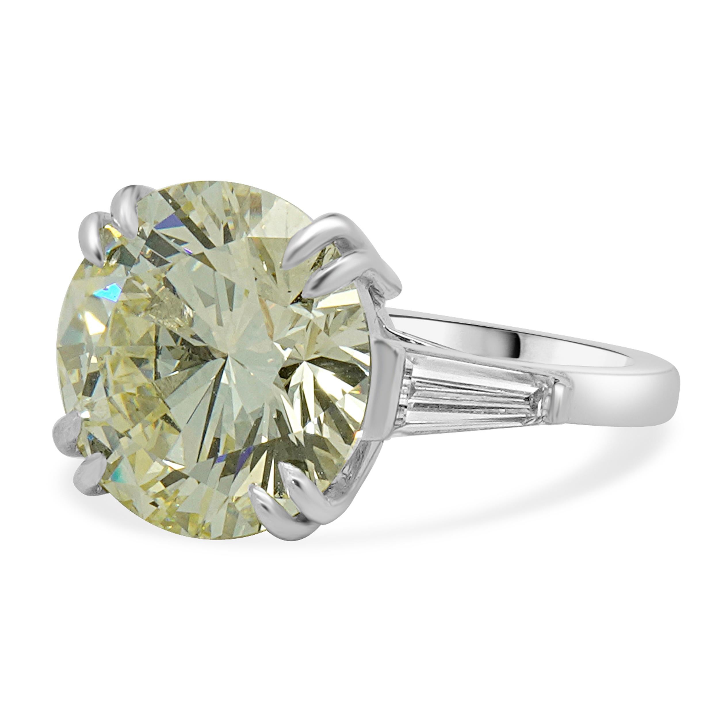 Material: platinum
Center Diamond: 1 round brilliant = 8.51ct
Color: O-P
Clarity: VS1
GIA: 2231236594
Diamond: baguette cut = 0.25cttw
Color: H
Clarity: VS2
Ring Size: 6.5 (please allow up to 2 additional business days for sizing