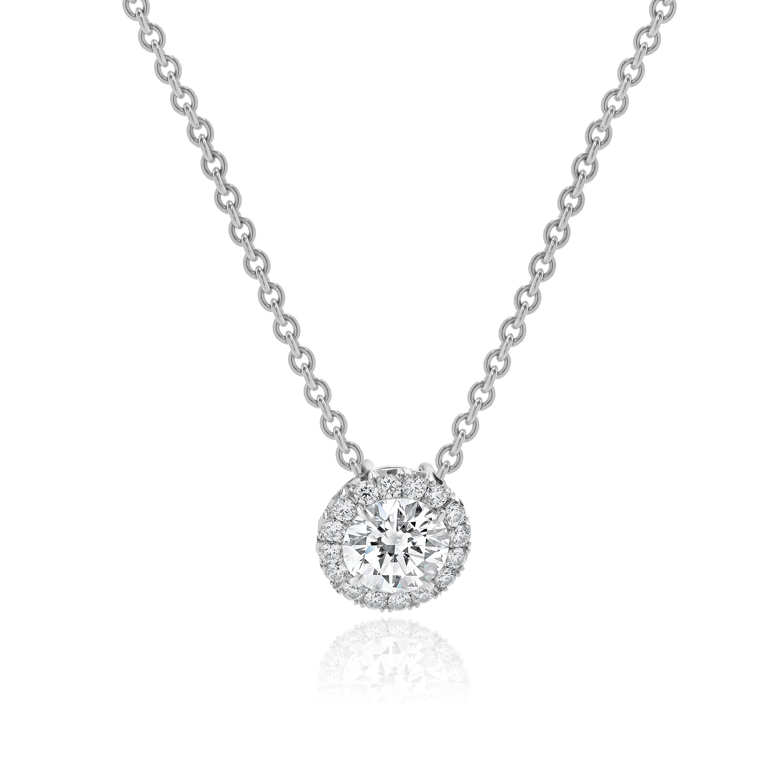 Designer: custom design
Material: platinum
Diamond: 1 round brilliant cut = 1.50ct
Color: I
Clarity: SI1
Diamond: 16 round brilliant cut = 0.40cttw
Color: G
Clarity: SI1
Dimensions: necklace measures 18-inches in length
Weight: 9.79 grams

