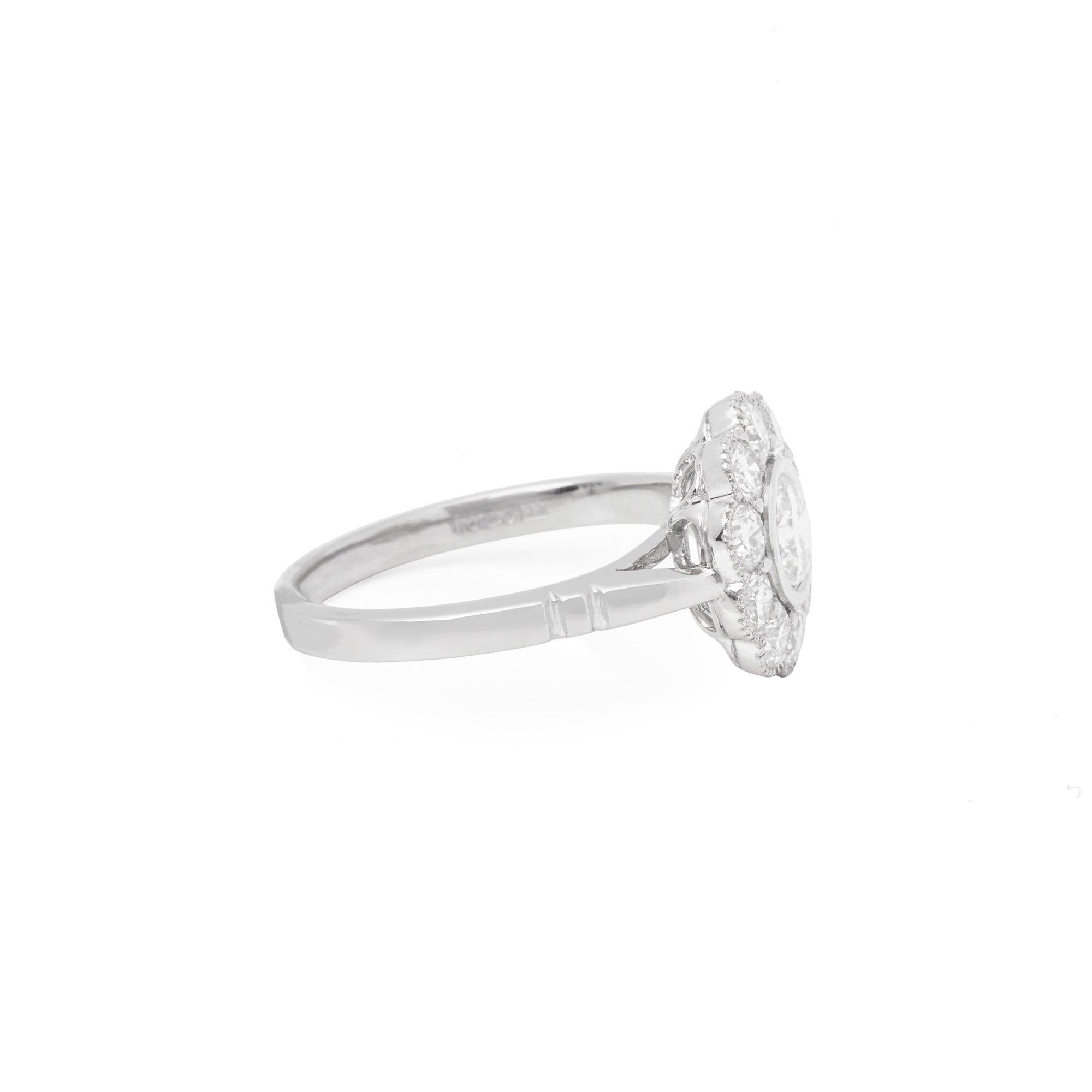 This Ring features a single Round Briliant Cut Diamond totalling 0.50cts with Millgrain Set Round Brilliant Cut Diamonds totaling 0.89cts. Set in Platinum. Ring size UK L1/2, EU Size 52, USA Size 6. Complete with Xupes Presentation Box. Our Xupes