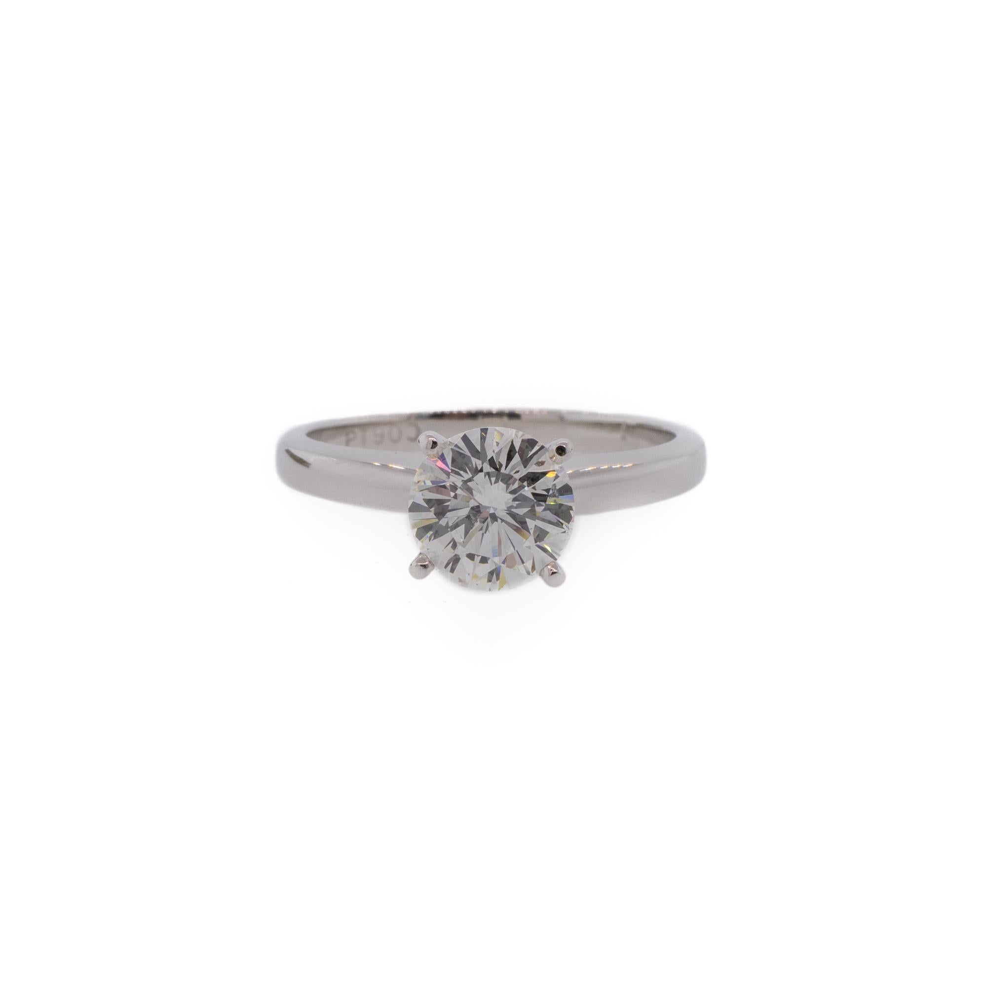 A round brilliant cut diamond in a four-prong platinum solitaire setting is a perfect combination of elegance and minimalism. This diamond is 1.07ct, rated I for color and SI2 for clarity, in a patented diamond cut called 