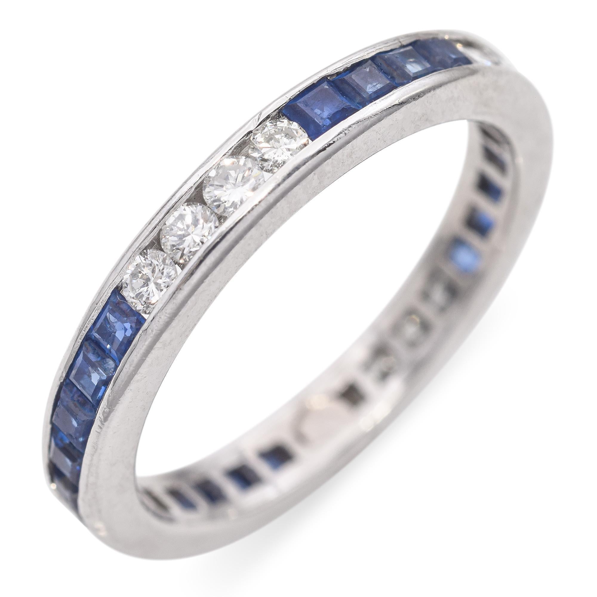 A beautiful band featuring alternating sections of round brilliant cut diamonds and square cut sapphires, set in a sleek platinum band. Some minor chips on sapphires.

Weight: 4 grams
Stone: Sapphire 0.5tcw; Diamond 0.28tcw;
Measurements: 3mm
Ring