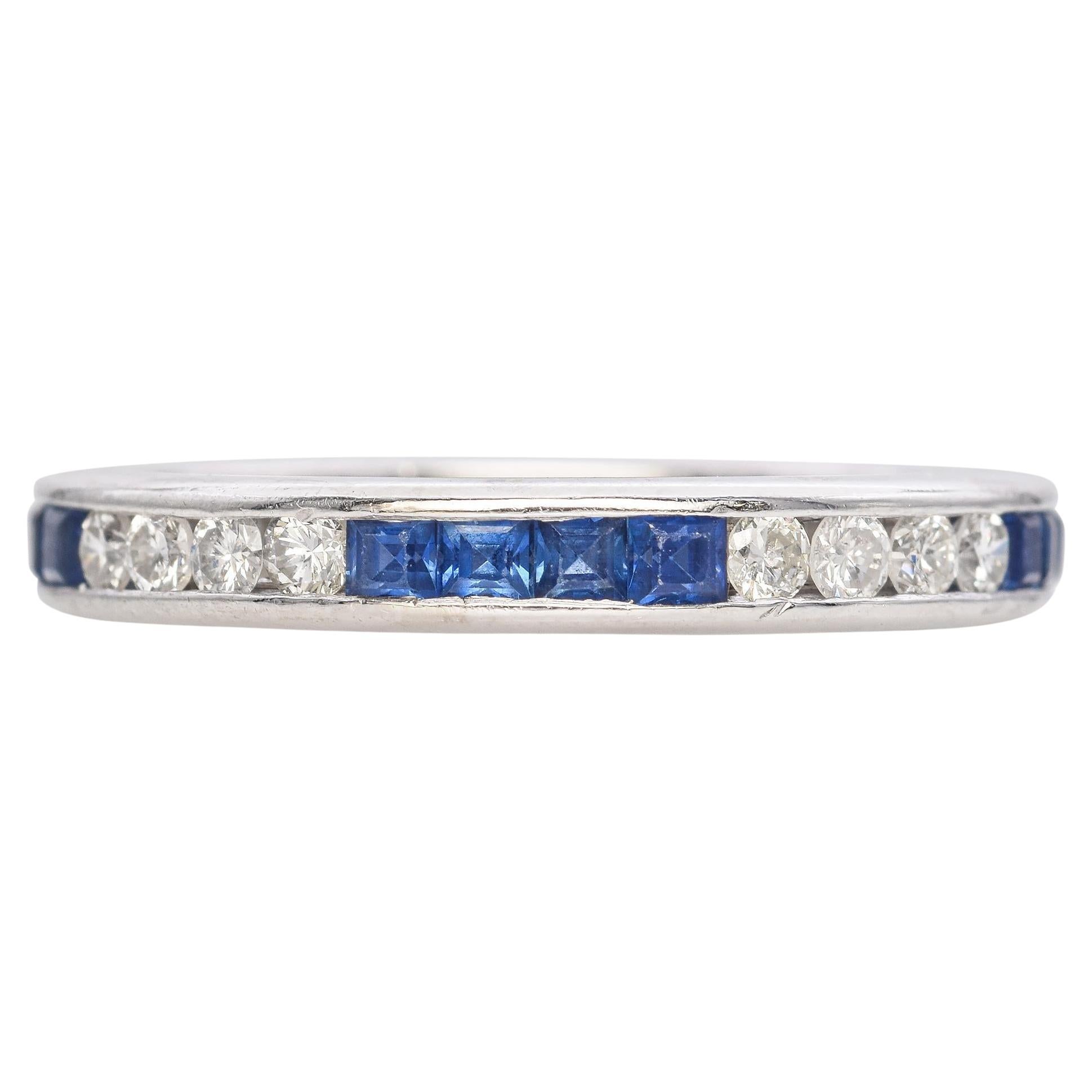Platinum Round Brilliant Diamond and Calibre Cut Blue Sapphire Band For Sale