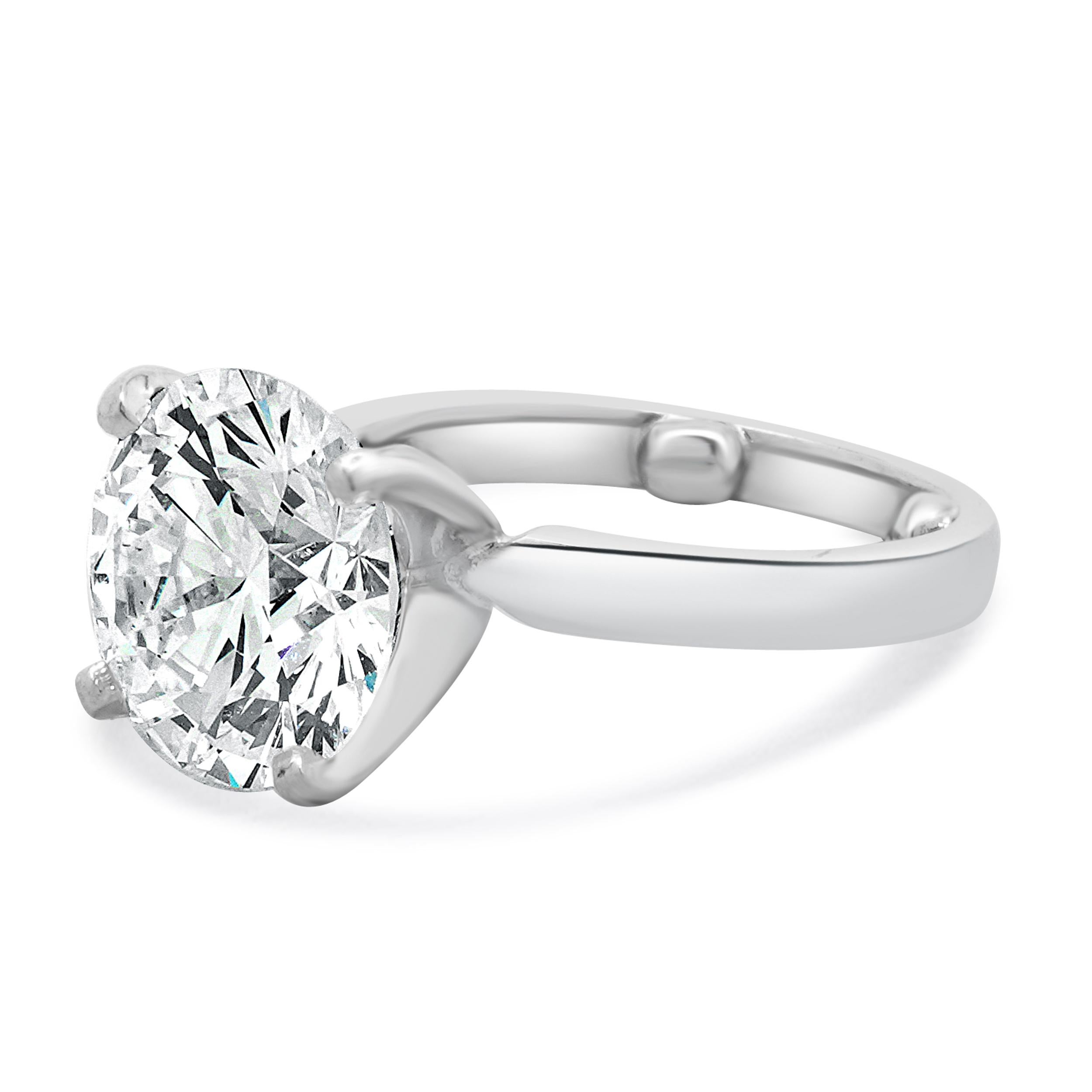 Material: Platinum
Center Diamond: 1 round cut = 4.50ct
Color: J
Clarity: SI1
GIA: 2175173794
Ring Size: 3.5 (please allow up to 2 additional business days for sizing requests)
Dimensions: ring top measures 10.6mm
Weight: 6.47 grams
