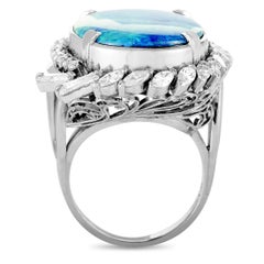 Platinum Round, Marquise, and Tapered Baguette Diamonds and Large Opal Oval Ring