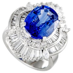 Platinum Round, Marquise and Tapered Baguette Diamonds and Sapphire Oval Ring Platinum Round, Marquise and Tapered Baguette Diamonds and Sapphire Oval Ring