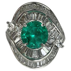 Vintage Platinum Round Shaped Emerald Diamond Ring
