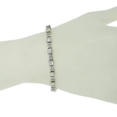 Platin-Tennisarmband mit runden Platin-Diamanten und Baguettes