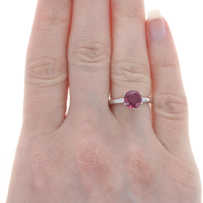 Size: 5 3/4
Sizing Fee: Down 2 for $50 or up 2 for $60

Metal Content: Platinum

Stone Information

Natural Rubellite Tourmaline
Carat(s): 1.83ct
Cut: Round
Color: Purplish Red

Total Carats: 1.83ct

Style: Solitaire

Measurements

Face Height